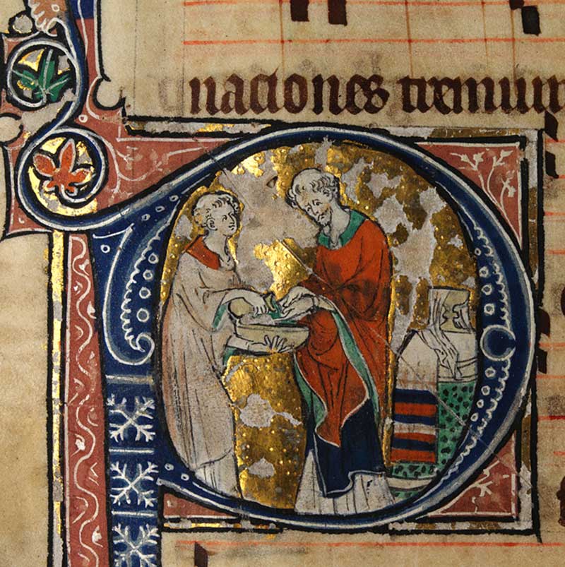 Een priester wast zijn handen voor de mis (bron: Missaal, c. 1310-1320. National Library of Wales via Wikimedia Commons. Publiek domein)