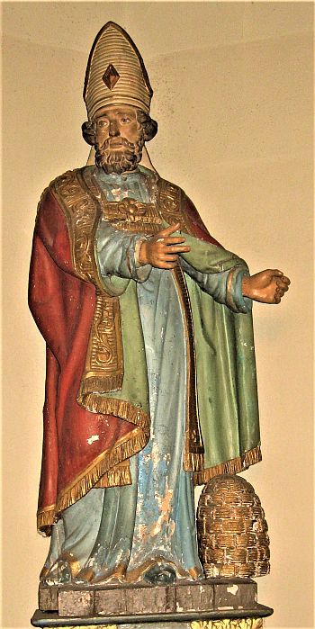 De heilige Ambrosius (met bijenkorf aan zijn voeten)